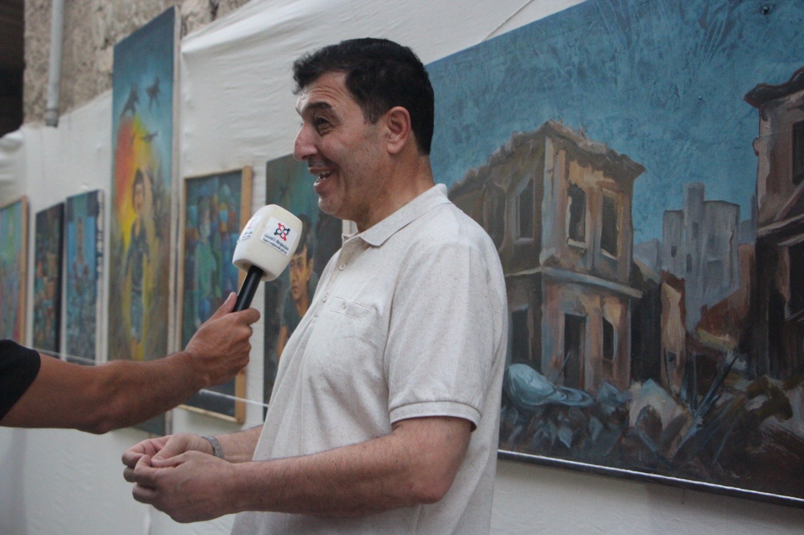 موسوعة المخيمات الفلسطينية تزور معرض: غزة يا جرحنا المفتوح، للفنان التشكيلي علي جروان ولمؤسسة كوشان، بعدسة لين محمد